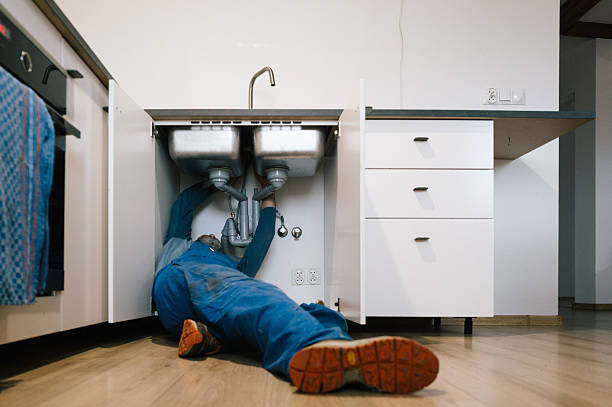 Professional Drain Cleaning technician working in Swan Valley, ID